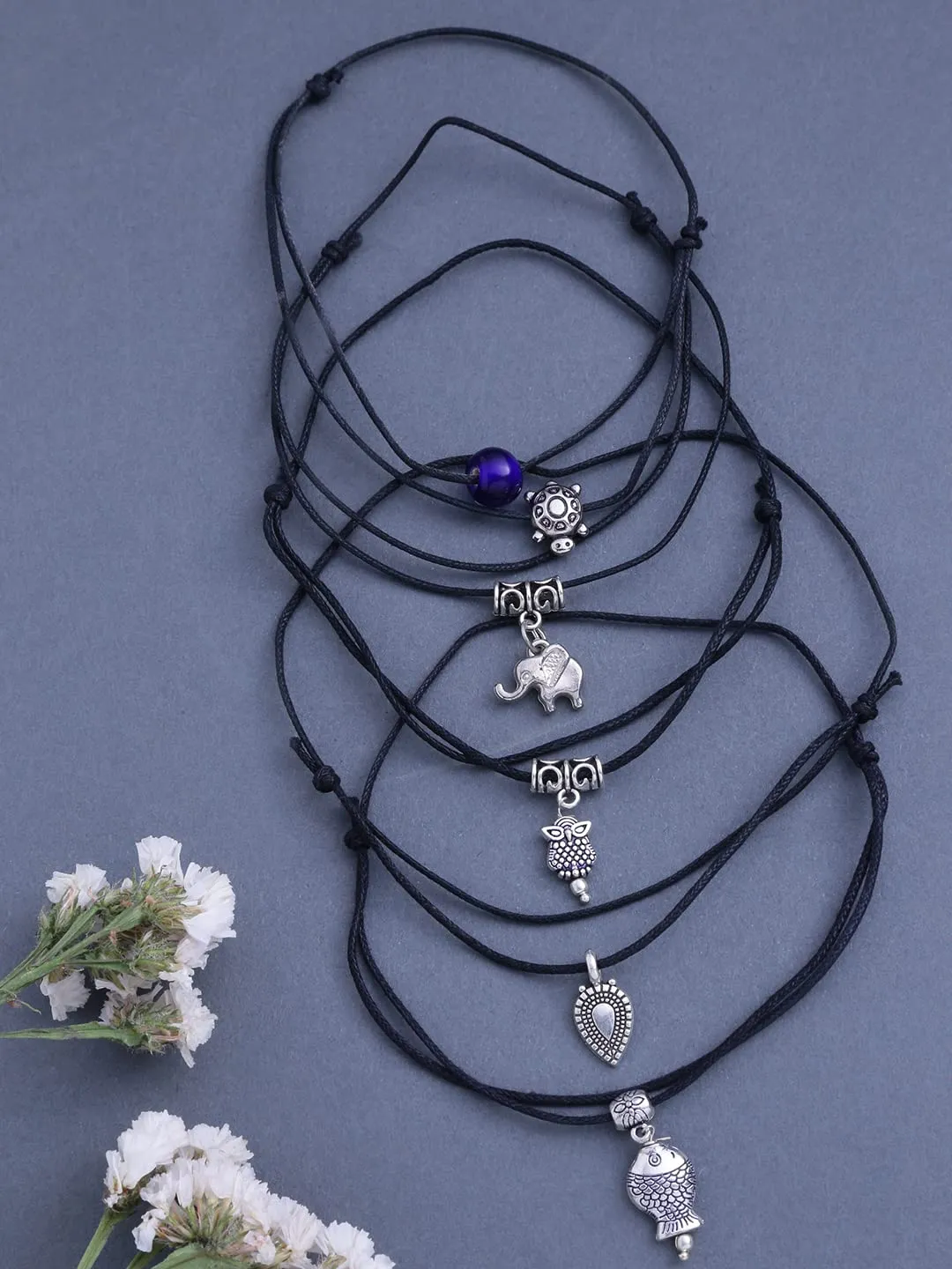 Yellow Chimes Latest Trend 5 Pieces Combo Black Thread Knot with Oxidized Single Charms Base Metal Adjustable Evil Eye Anklets for Women and Girls