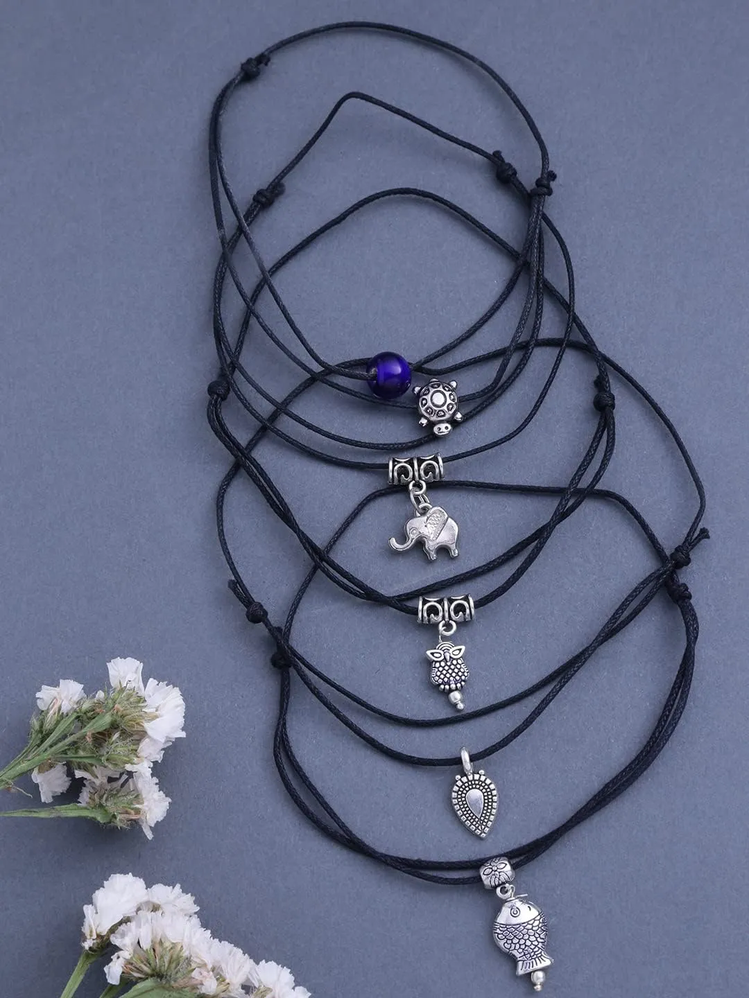 Yellow Chimes Latest Trend 5 Pieces Combo Black Thread Knot with Oxidized Single Charms Base Metal Adjustable Evil Eye Anklets for Women and Girls